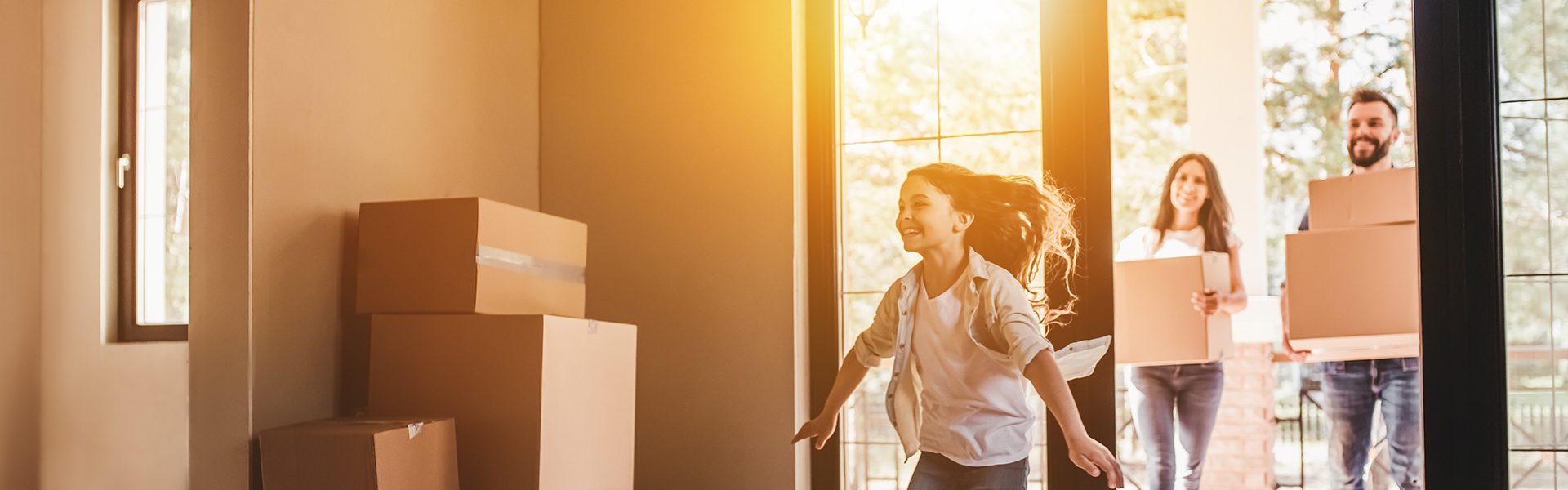 family entering a new home